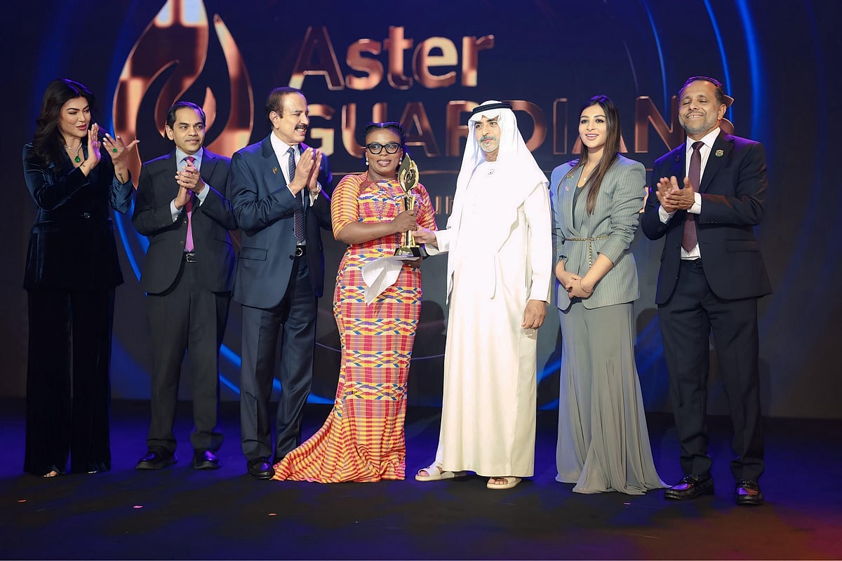 Sheikh Nahyan bin Mubarak Al Nahyan and Indian actress Sushmita Sen honour nurse Naomi Oyoe Ohene Oti, 48. Also seen in the photo are Dr Azad Moopen and Alisha Moopen.