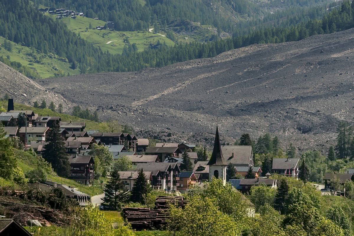 This photograph taken from Ferden shows a huge landslide next to the village of Wiler, on May 29, 2025, the day after the Birch Glacier collapsed and partially destroyed the small village of Blatten in the Swiss Alps.