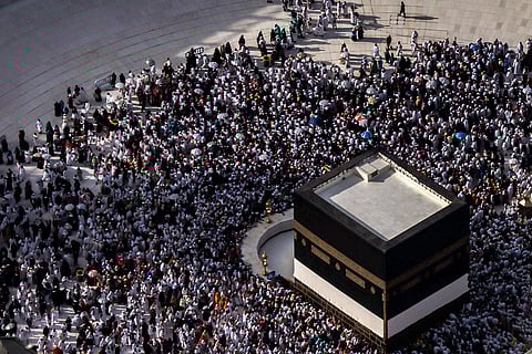Muslim worshippers gather around the Kaaba, Islam's holiest shrine, at the Grand Mosque complex in the holy city of Mecca.