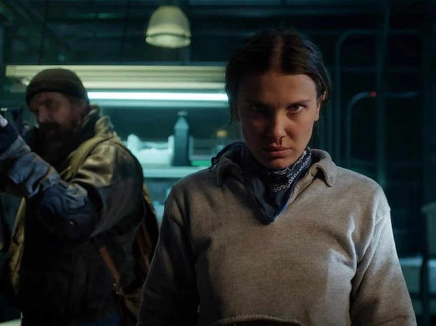 David Harbour and Millie Bobby Brown as Jim Hopper and Eleven, in Stranger Things