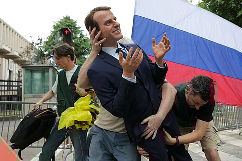 Greenpeace environmental activists set up a wax statue of French President Emmanuel Macron - they say to have stolen from the Musee Grevin - during an action against France's gas and fertilizer imports from Russia, outside the Russian Embassy in Paris.