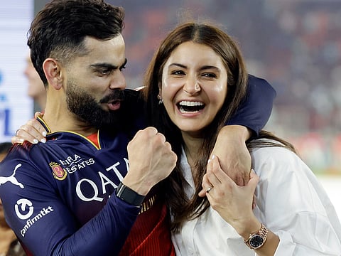 Virat Kohli celebrate with his wife Anushka Sharma after winning the Indian Premier League 2025 final match against Punjab Kings, at Narendra Modi Stadium in Ahmedabad on Tuesday. 
