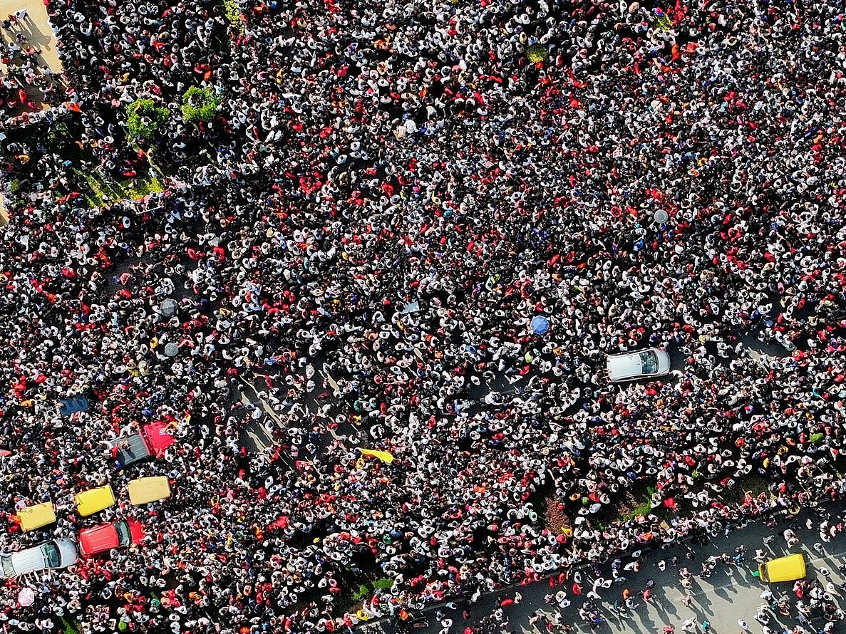 A massive crowd gathered for the Royal Challengers' victory celebrations near Vidhana Souda in Bengaluru on Wednesday.