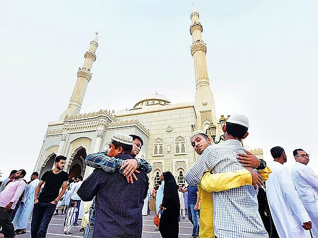 Muslims mark Eid Al Adha, or the "Festival of the Sacrifice", with prayers and greetings at a mosque in Sharjah, United Arab Emirates. 