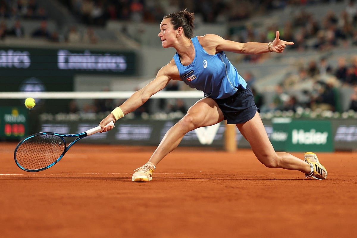 France's Lois Boisson plays a backhand return to US Coco Gauff during their women's singles semi-final of the French Open tennis at the Roland-Garros Complex in Paris on June 5, 2025. Gauff won and entered the final. 