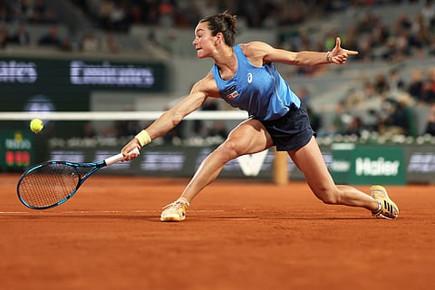 France's Lois Boisson plays a backhand return to US Coco Gauff during their women's singles semi-final of the French Open tennis at the Roland-Garros Complex in Paris on June 5, 2025. Gauff won and entered the final. 