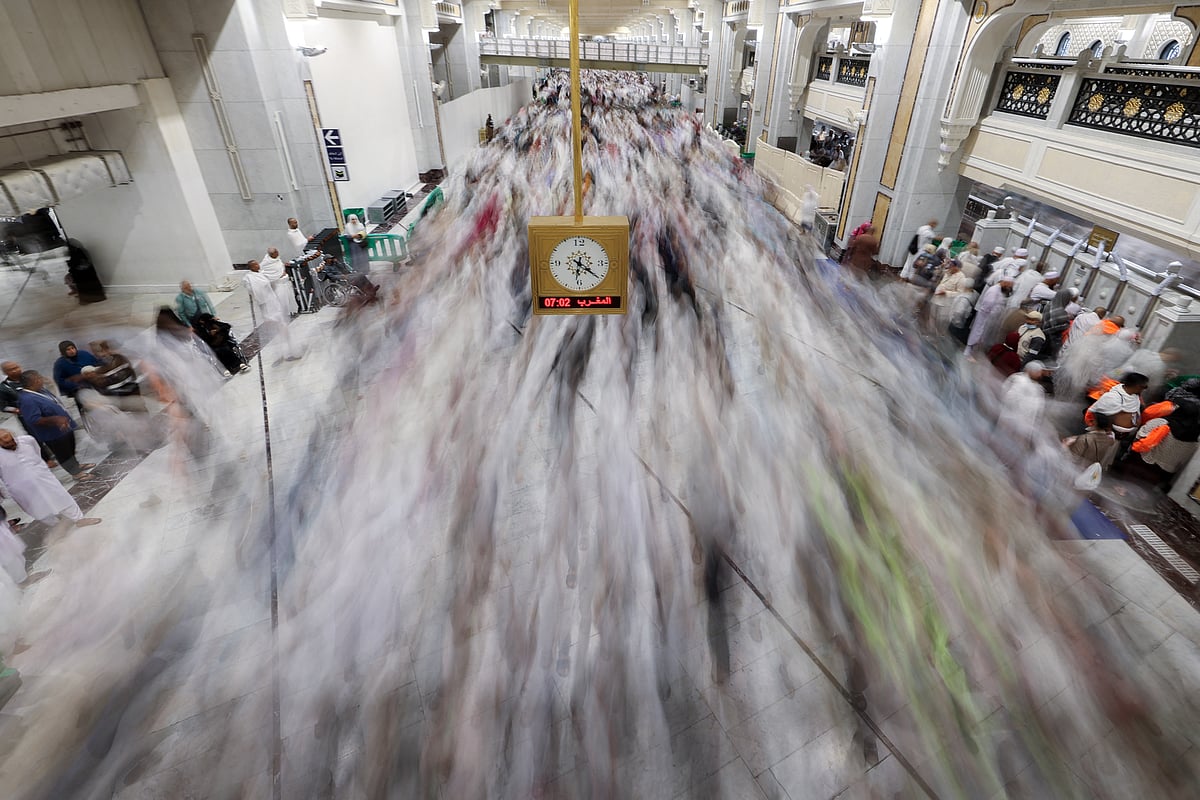 Worshippers make their way towards the Kaaba in Mecca