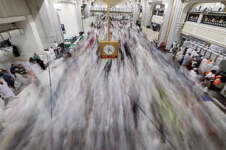 Worshippers make their way towards the Kaaba in Mecca