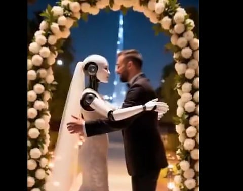 In the viral video, Ali dons a suit and “marries” a robot bride near Dubai’s Burj Khalifa, joined by robot guests, a cake-cutting, and a mock marriage contract.