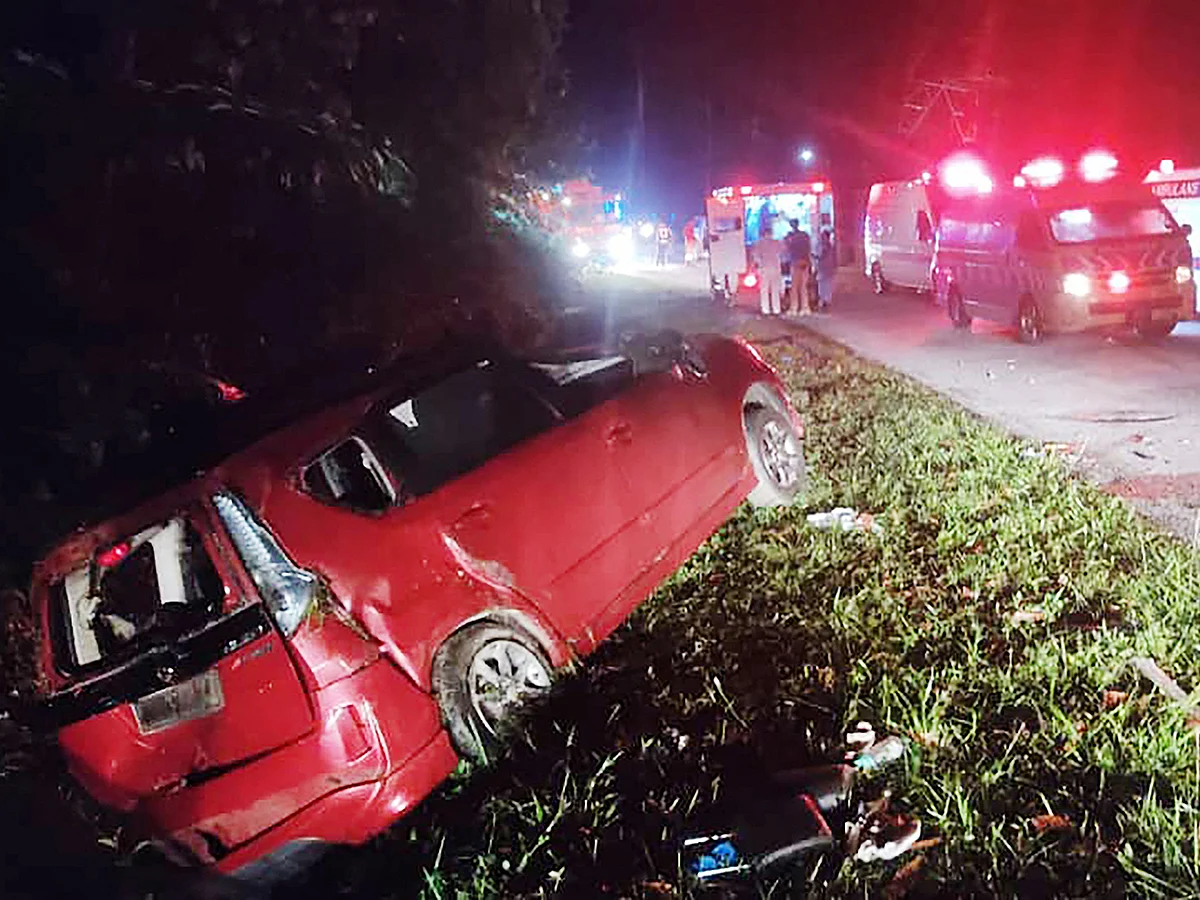 This handout photo taken and released by Perak's Fire and Rescue Department on June 9, 2025 shows a minivan after it collided with a bus in Gerik-Jeli, in Malaysia's Perak state. 
