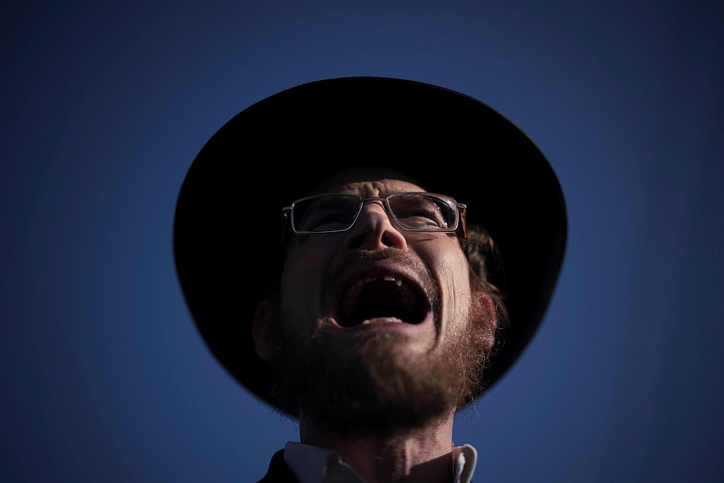 An ultra-Orthodox Jewish man shouts during a protest against army recruitment in Bnei Brak, Israel, Thursday, June 5, 2025.  
