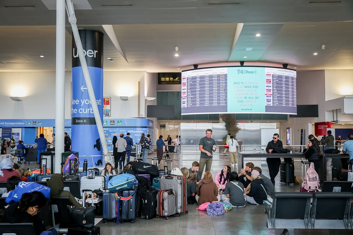 Travelers in Terminal 4 of John F. Kennedy International Airport (JFK) in New York, US, 