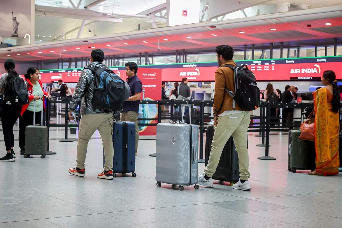 Travelers in Terminal 4 of John F. Kennedy International Airport (JFK) in New York, US, 