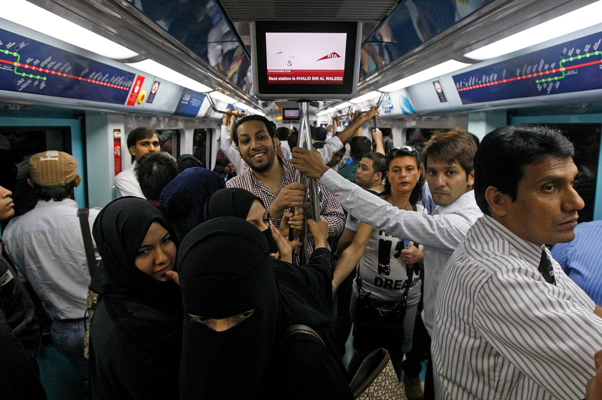 Commuters inside Dubai Metro