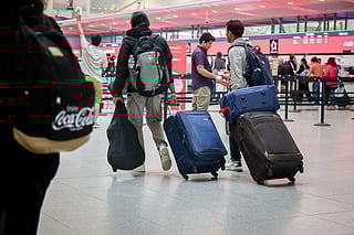 Travellers in Terminal 4 of John F. Kennedy International Airport (JFK) in New York, 
