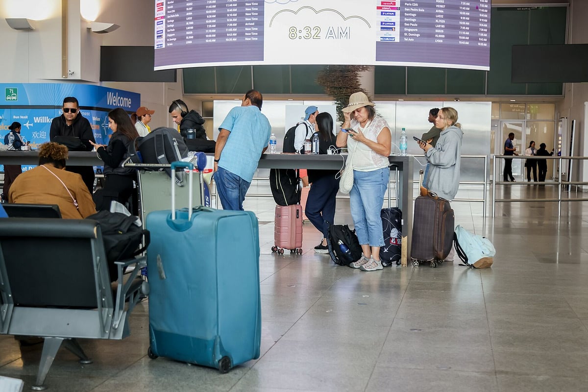Travelers in Terminal 4 of John F. Kennedy International Airport (JFK) in New York, US, 