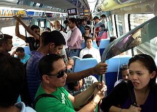 Commuters inside Dubai Metro