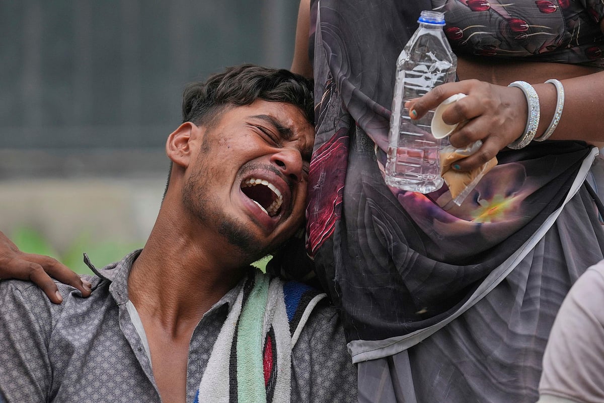 Kalpesh Bhai breaks down outside the autopsy room in Ahmedabad, mourning the loss of his 14-year-old brother, who perished in the Air India crash that devastated a neighbourhood on June 13, 2025. In the aftermath of the tragic Air India plane crash near Ahmedabad, haunting images have emerged capturing the deep sorrow and anguish of families who lost loved ones. The crash of AI-171, bound for London Gatwick, claimed 241 lives, leaving only one survivor.