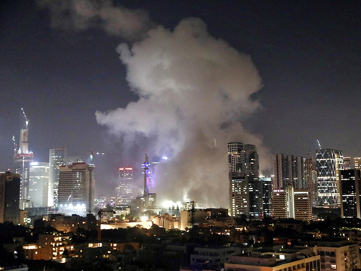 Smoke billows following a missile attack from Iran, in Tel Aviv on Saturday. 