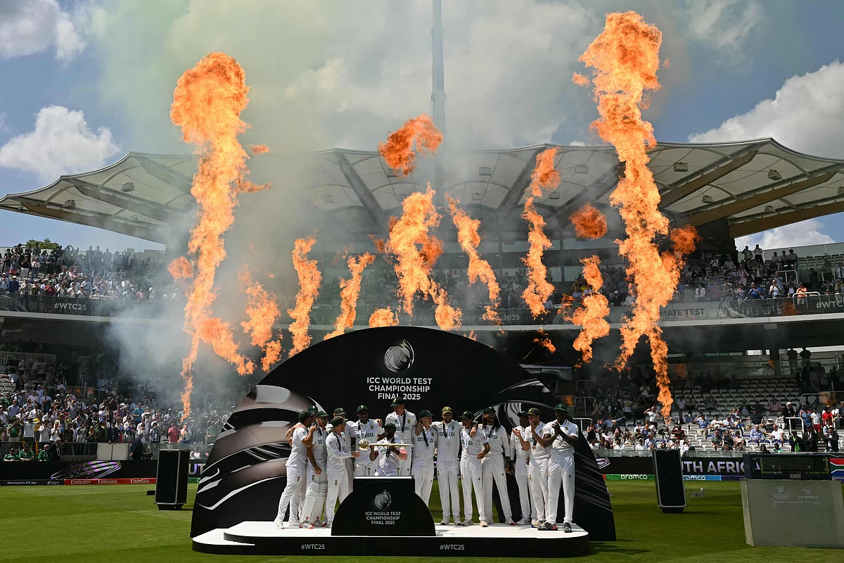 South Africa's captain Temba Bavuma lifts the ICC World Test Championship Mace as he celebrates with teammates after victory on day four of the ICC World Test Championship cricket final match against Australia, at Lord's cricket ground, in London, on June 14, 2025.