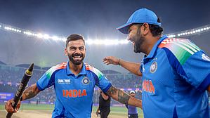 Skipper Rohit Sharma (right) and Virat Kohli celebrate the Champions Trophy triumph in Dubai. The duo's ODI future has been the subject of speculation over the past weeks.