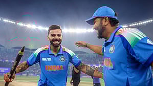 Skipper Rohit Sharma (right) and Virat Kohli celebrate the Champions Trophy triumph in Dubai. The duo's return to ODI since could be delayed with the Bangladesh series facing a reschedule.