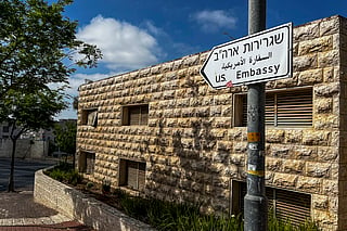 A road sign shows the way towards the US embassy in Jerusalem on April 19, 2024.