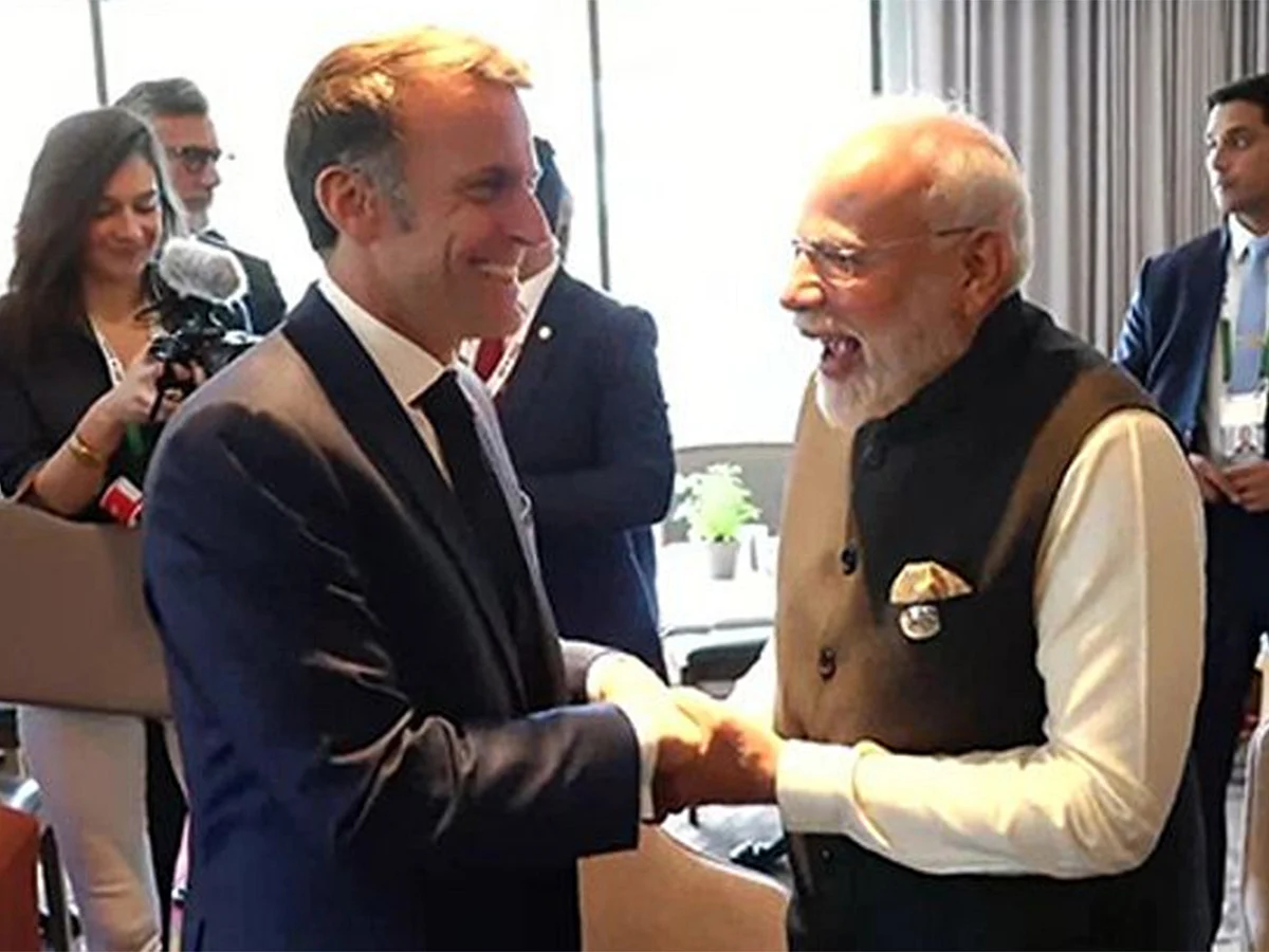 The video of their exchange, in which PM Modi jokingly remarks about Macron's presence on social media, has gone viral across platforms.