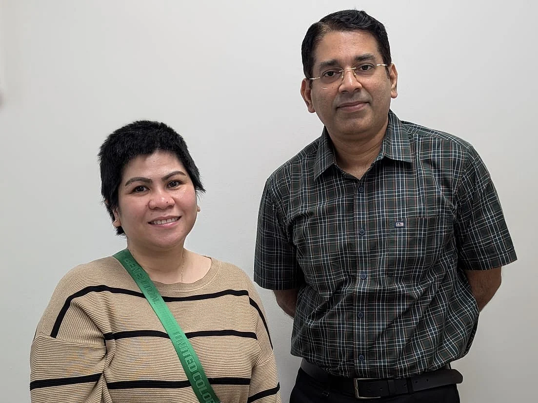 Jovelyn Sison Omes with Dr Prakash Nair, who led the complex brain surgery.