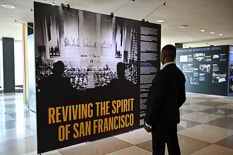 A man looks at the “UN Charter” exhibition ahead of the 80th anniversary of its signing at the United Nations Headquarters on June 20, 2025 in New York.