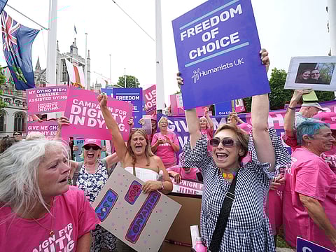 Dignity in Dying campaigners celebrate after the Terminally Ill Adults (End of Life) Bill was passed in the House of Commons, in London, on Friday,  June 20, 2025.