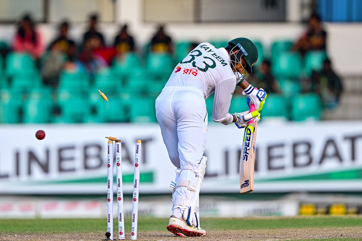 Bangladesh's Nayeem Hasan is clean bowled by Sri Lanka's Asitha Fernando during the first day of the second Test cricket match at the Sinhalese Sports Club (SSC) in Colombo on June 25, 2025.