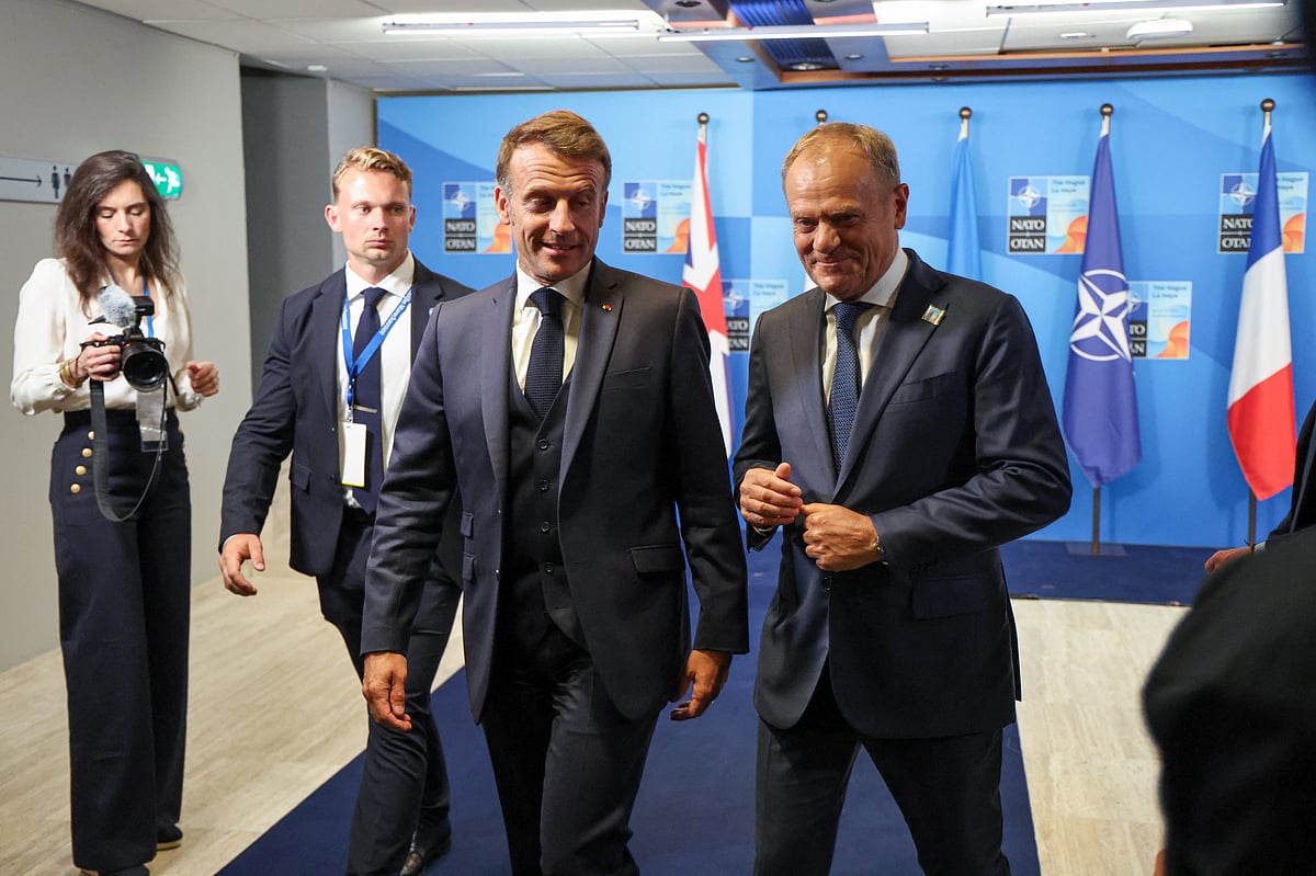 France's President Emmanuel Macron and Poland's Prime Minister Donald Tusk leave after posing for a group photo within a meeting between the Nato Secretary General, the president of Ukraine, and leaders of E5 countries during a North Atlantic Treaty Organization (NATO) Heads of State and Government summit in The Hague. File photo taken on June 25, 2025.
Poland and the UK are expected to sign in London on Wednesday a new defence treaty, expanding cooperation between the Nato allies to counter security threats, including from Russia.
