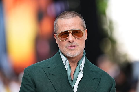 Brad Pitt poses for photographers upon arrival at the premiere of the film 'F1 The Movie' on Monday, June 23, 2025, in London.