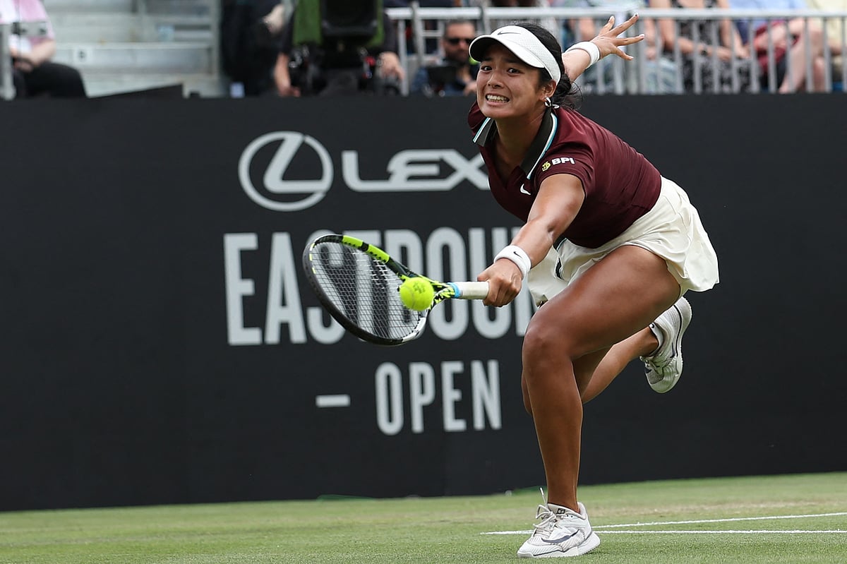 Philippines' Alexandra Eala stretches to return to Australia's Maya Joint during their women's singles final tennis match on day six of the Lexus Eastbourne International tennis tournament in Eastbourne, southern England, on June 28, 2025.