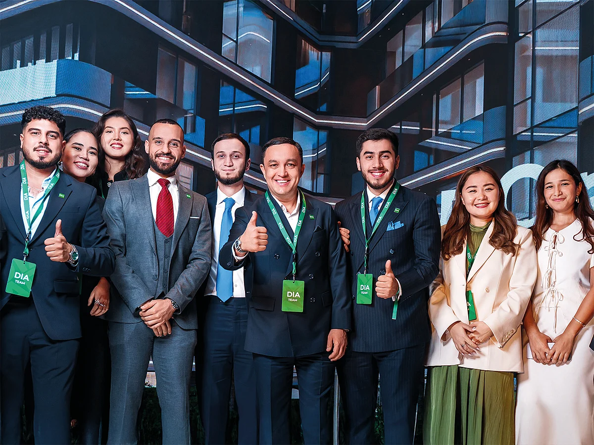 Faruh Kurbanov, Founder of DIA Properties, with the DIA Properties team