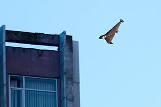 FILE - A Russian drone attacks a building during massive missile and drone air attack in Kyiv, Ukraine, June 17, 2025. (AP Photo/Efrem Lukatsky, file)