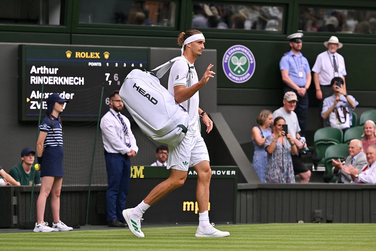 Germany's Alexander Zverev departs the court after his men's singles first round tennis match against France's Arthur Rinderknech on the second day of the 2025 Wimbledon Championships at The All England Lawn Tennis and Croquet Club in Wimbledon, southwest London, on July 1, 2025.