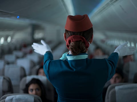 Flight attendants manage a busy environment and are there to help. Politeness and patience go a long way, especially during stressful situations like turbulence or delays.