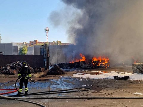 Firemen work on the site of an explosion in a fuel station in Rome on July 4, 2025. 
