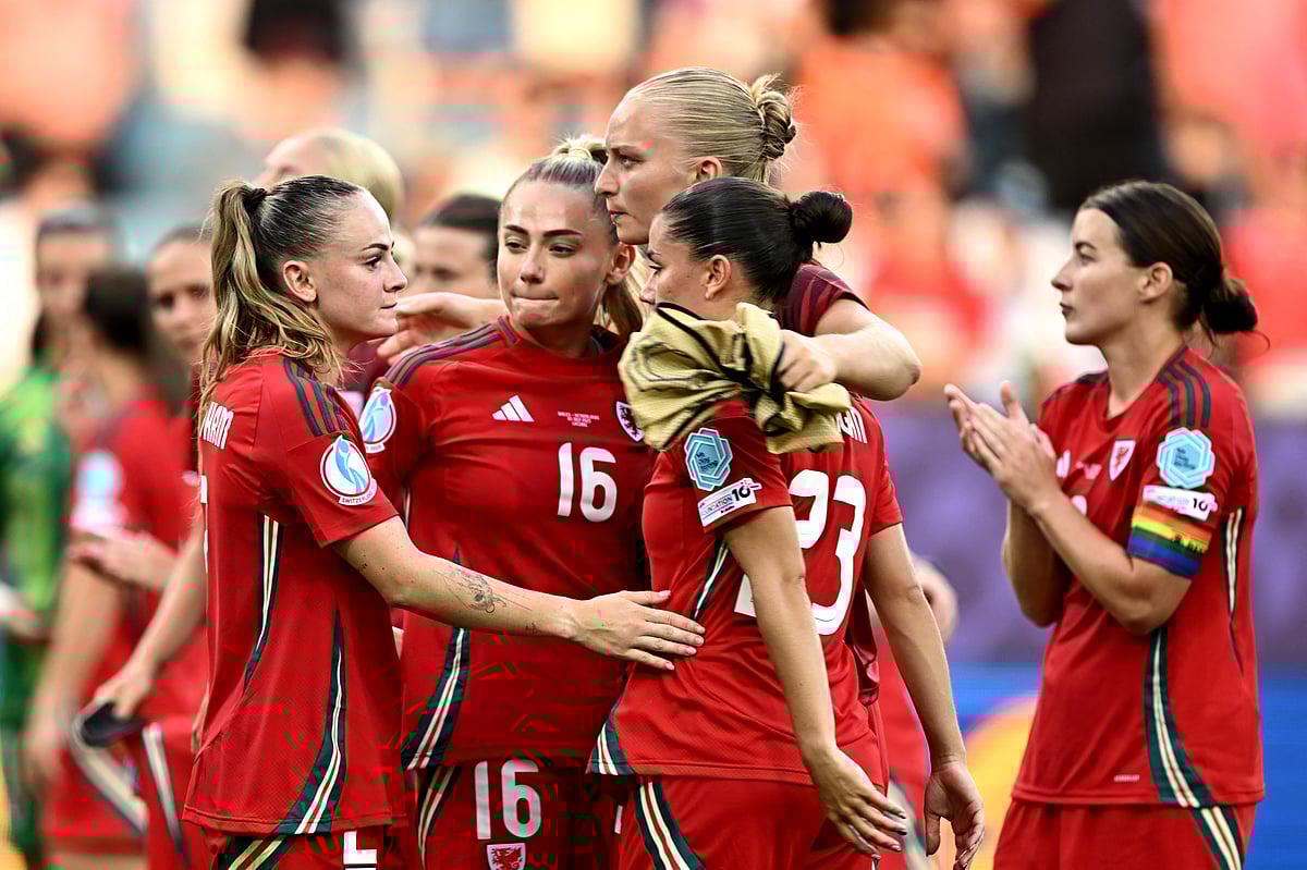 Wales' defender Lily Woodham, defender Charlotte Estcourt, forward Elise Hughes and forward Ffion Morgan hug after their team's 0-3 defeats against The Netherlands during the UEFA Women's Euro 2025 Group D football match between Wales and The Netherlands at the Allmend Stadion Luzern in Lucerne on July 5, 2025.