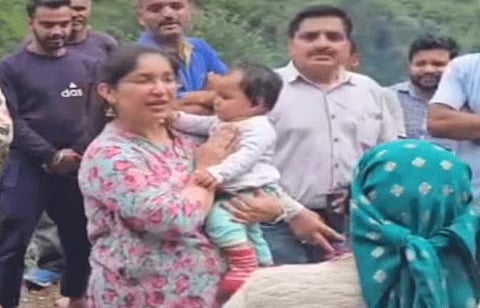 
A photo of Sub-Divisional Magistrate (SDM) Samritika Negi holding Nikita in her arms has gone viral, capturing hearts across India. 
