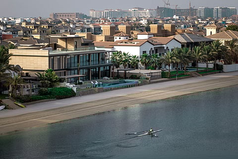 A picture shows beachfront villas in the Palm Jumeirah in the Gulf emirate of Dubai on July 8, 2025.