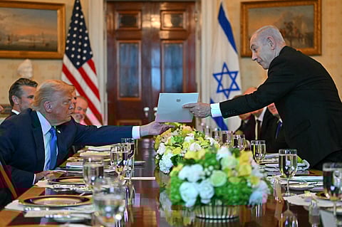 “He’s forging peace, as we speak, in one country, in one region after the other,” Netanyahu said, handing over the signed nomination letter.