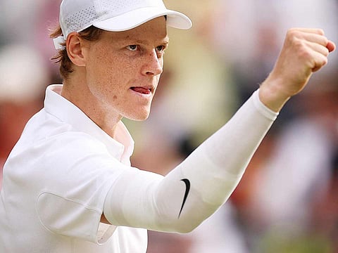 Italy's Jannik Sinner celebrates after winning against  US player Ben Shelton during their men's singles quarter-final match of the 2025 Wimbledon Championships at The All England Lawn Tennis and Croquet Club in Wimbledon, southwest London, on July 9, 2025. 