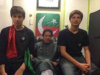 Imran Khan seated with his sons, Suleman and Kasim (Image: X/@qasim__khan) -- File photo