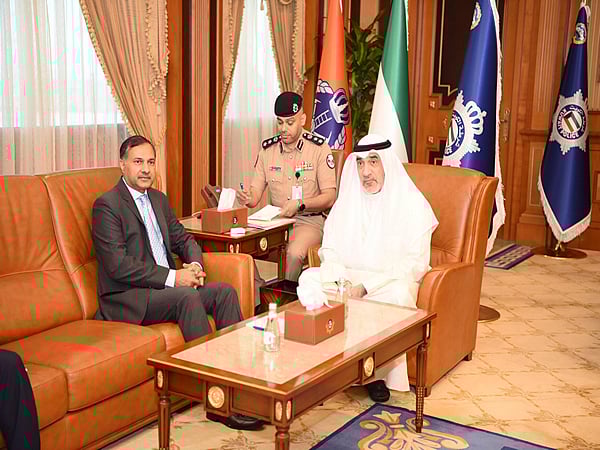 Indian Ambassador Adarsh Swaika with Kuwait’s Deputy PM Fahad Yousef Saud in a file picture.
