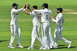 India's Mohammed Siraj (C) celebrates with teammates after taking the wicket of England's Jamie Smith on the second day of the third cricket test match between England and India at Lord's cricket ground in London, on July 11, 2025.