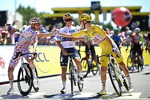 Tim Wellens won a baking and hilly stage 15 of the Tour de France at the walled citadel of Carcassonne on Sunday as his UAE teammate Tadej Pogacar retained the overall race lead.