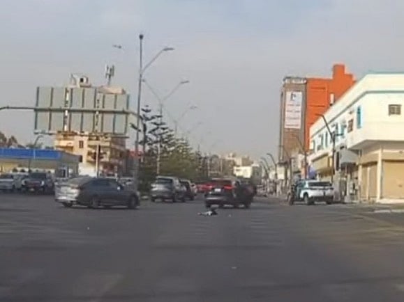 The incident was recorded by a dash camera in a nearby vehicle.